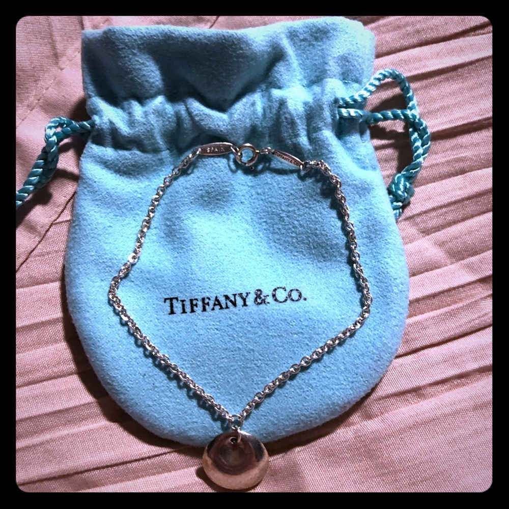 Authentic Tiffany’s Silver Charm bracelet